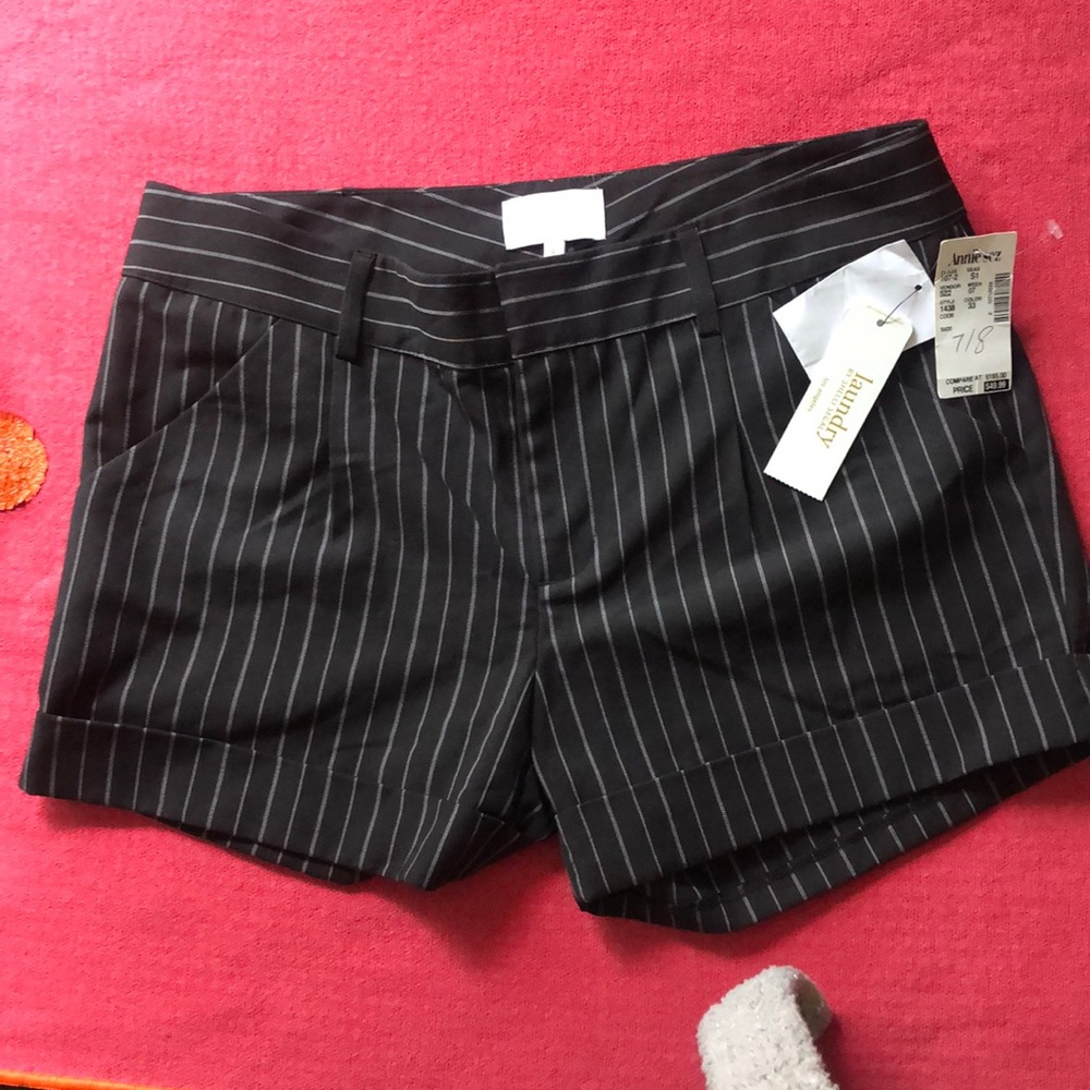 Striped shorts with tags